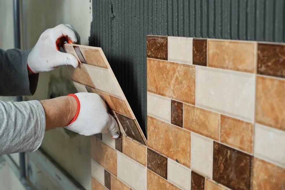 depositphotos 59396847 stock photo laying ceramic tiles